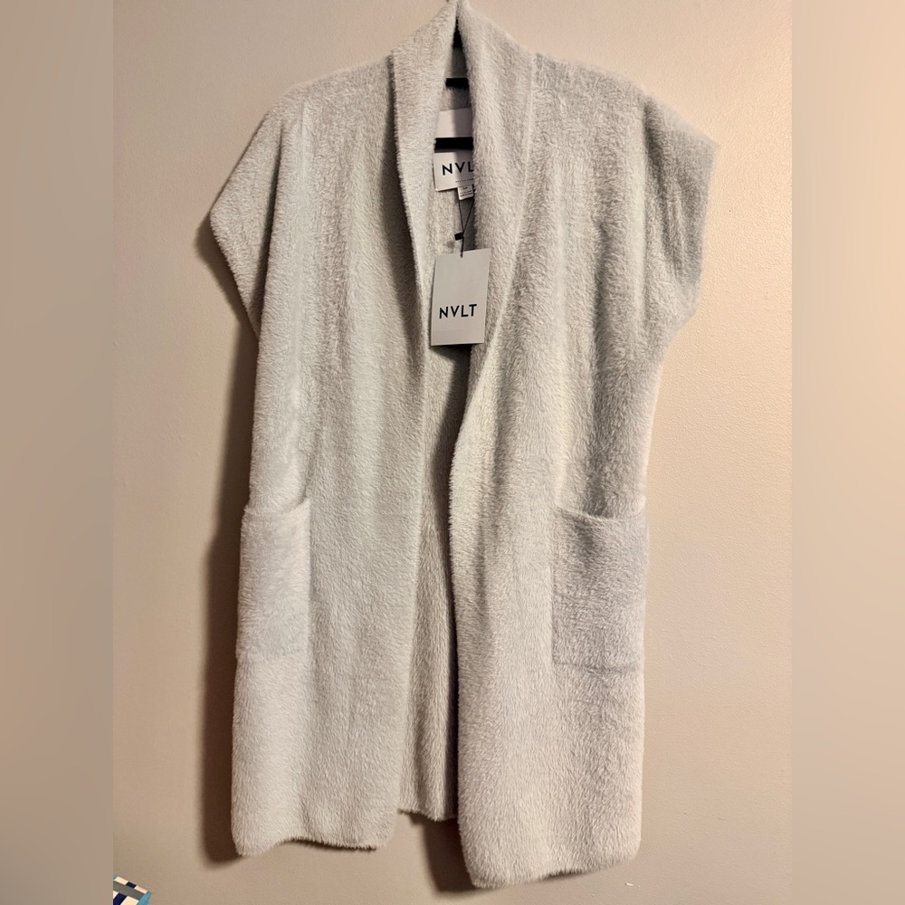 NVLT women's eyelash coatigan vest in a light grey or off-white color.